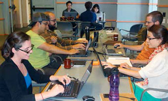 Grad students with laptops